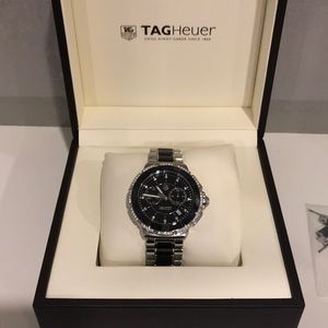 Tag Heuer black and silver diamond watch